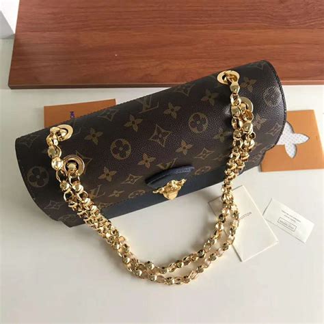 louis vuitton chain for bag.